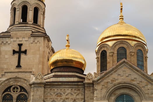 Upper facade, roof, cupolas, bell tower of the Dormition of the Mother of God Cathedral in Varna, Bulgaria 2022