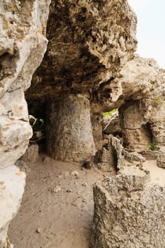 Rock formation in the shape of a roof on pillars at the Pobiti Kamani stone forest, close to Varna, Bulgara 2022