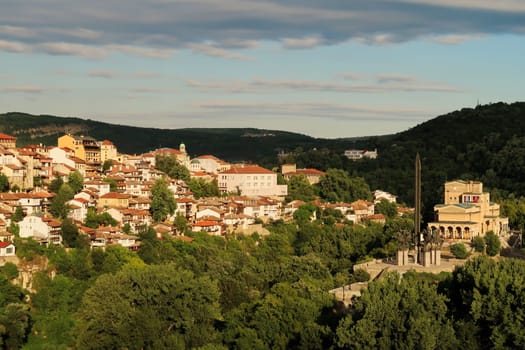 Spectacular view onto the old town and the Monument to the Asen, Assen Dynasty at sunset, Veliko Tarnovo, Bulgaria 2022
