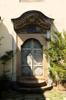 Decorated door, doorway in the courtyard of the Hindliyan House, an example of National Revival Architecture in Plovdiv, Plowdiw, Bulgaria 2022