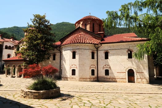 View over the courtyard to the Assumption of the Holy Virgin Church, the main church of the Bachkovo Monastery, close to Plovdiv, Bulgaria 2022