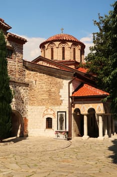 The Church St., Saint Archangels Michael and Gabriel in one of the courtyards of the Bachkovo Monastery, an icon on one of its walls, close to Plovdiv, Bulgaria 2022