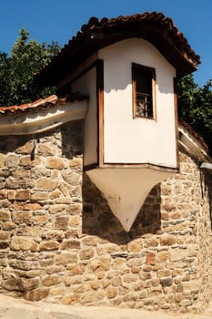 Beautiful bay window in one of the outer walls of the ancient acropolis around the Regional Ethnographic Museum in the old town of of Plovdiv, Plowdiw, Bulgaria 2022