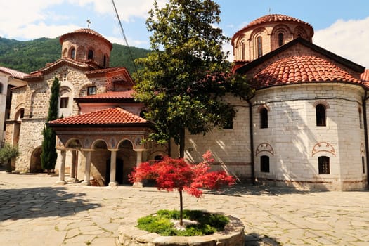View over the courtyard to the main church Assumption of the Holy Virgin and the St., Saint Archangels Michael and Gabriel Church, Bachkovo Monastery, close to Plovdiv, Bulgaria 2022