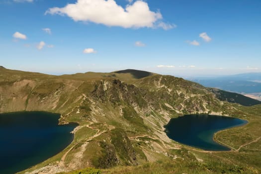 Spectacular view onto the Eye, Okoto Lake and Kidney, Babreka Lake with their deep blue water, two of the Seven Rila Lakes, situated on a plateau in the Rila National Park, close to Sofia, Bulgaria 2022