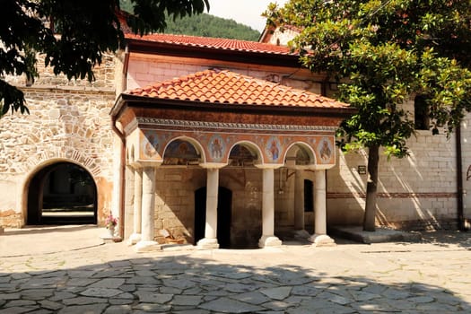 The entranc to the Church St., Saint Archangels Michael and Gabriel in one of the courtyards of the Bachkovo Monastery, close to Plovdiv, Bulgaria 2022