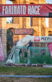 Merida, Spain - May 18th, 2024: FarinatoRace Merida 2024. Finish line with a burning log