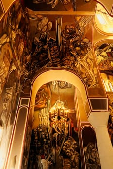 The interior of the Patriarchal Cathedral, Church of the Holy Ascension of the Lord, completely covered in modernist murals, wall paintings, frescos showing scenes from the history of Bulgaria, Tsarevets Fortress, Veliko Tarnovo, Bulgaria, 11th of July 2022
