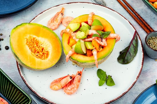 Delicious Asian salad of melon, shrimp and avocado.