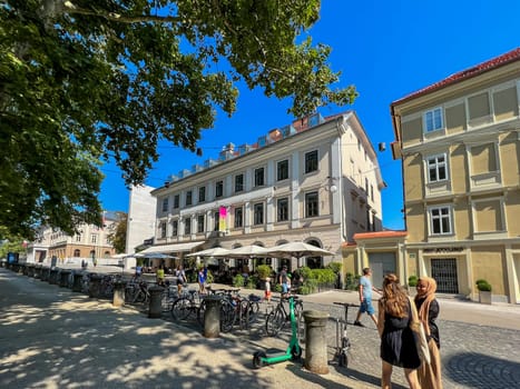 A cafe on Kongresni Trg street, view of people on the street