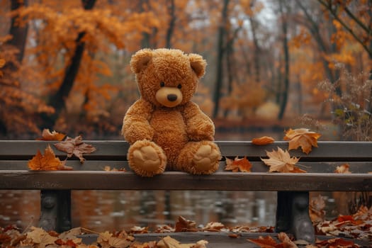 Teddy bear sitting on a park bench, forgotten lonely child toy with wet fur, rainy day in autumn