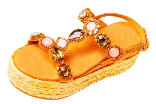 Leather shoes isolated. Close-up of a single of elegant female suede sandals with rhinestones. Isolated on white background. Macro. Clipping path.