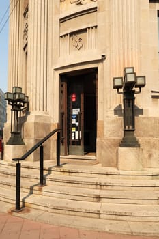 The entrance of the beautiful historic art deco building that houses the post, postal office in Nis, Serbia 2022