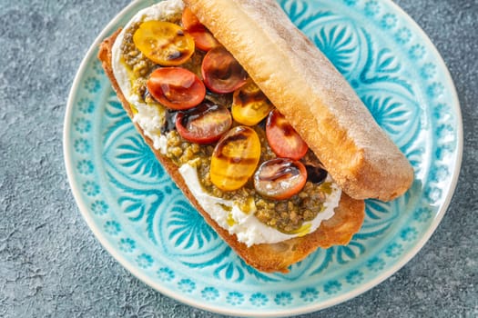 Bruschetta with burrata cheese, pesto and tomatoes
