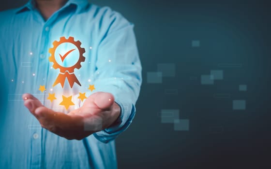 Quality Assurance Concept, Human shows the sign of the top service Quality, Guarantee, Standards, ISO certification and standardization concept, five stars, excellence service, high quality.