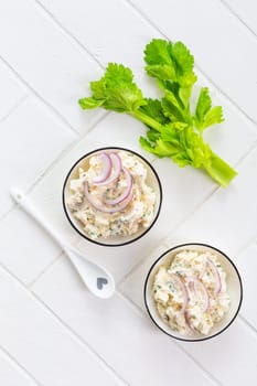 Fish and egg spread, paste or salad with red onions