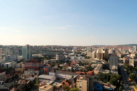 View from the bell, clock tower of the Cathedral of Saint, St. Mother Theresa onto the city center of Prishtina, Pristina, the Palace of Youth and Sports can be seen, Prishtina, Pristina, Kosovo 2022