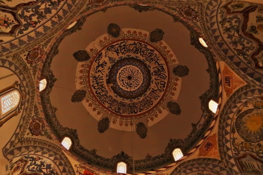 Elaborate ceiling painting, fresco, decoration, pattern, ornament inside the Sinan Pasha Mosque, an ottoman mosque in the old town of Prizren, Kosovo 2022