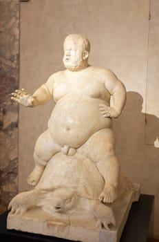 Florence, Italy - 28 December 2023: Morgante riding a tortoise, marble statue by Valerio Cioli, 1568. The dwarf Morgante belonged to the Medici family entourage. Original sculpture located in Boboli Gardens.