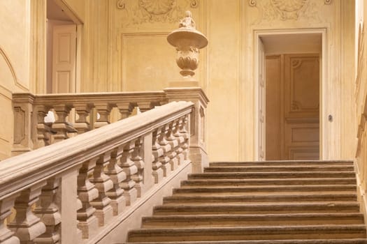 Turin, Italy - April, 2023: luxury baroque staircase, elegant vintage interior
