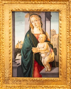 Turin, Italy - 12 December 2023: Madonna and Child, by Sandro Botticelli, ca 1490 - tempera on panel