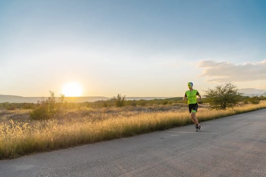 Triathlete in professional gear running early in the morning, preparing for a marathon, dedication to sport and readiness to take on the challenges of a marathon