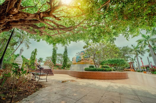 Traditional park of Nagarote, Nicaragua. A relaxed park with a wooden bridge over a water fountain, Beautiful Nagarote central park on sunny day
