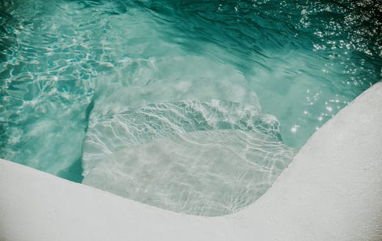 Design and detail of stairs of a home pool. Details of stairs of a home swimming pool
