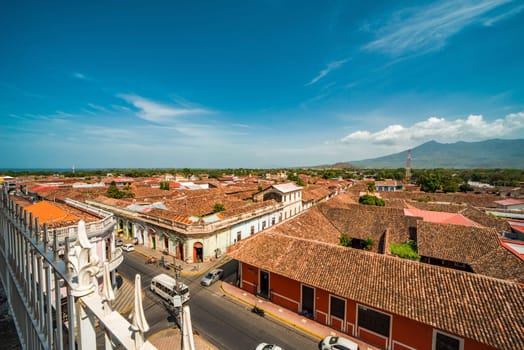 Top view of the facade of some colorful colonial buildings in the city of Granada. View of the tiled roofs of the colorful buildings in Granada, Nicaragua