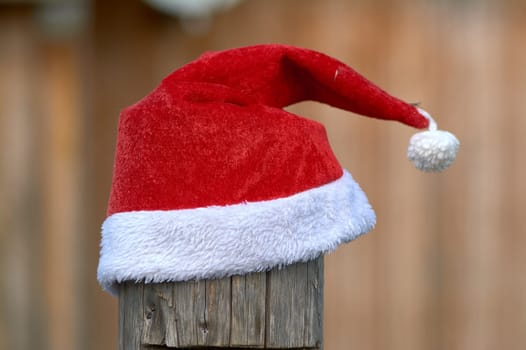 santa Claus hat is put on a pole. High quality photo