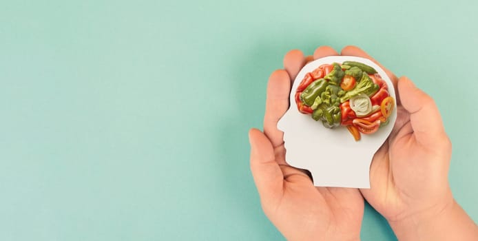 Brain made from vegetables like carrots, broccoli and paprika, healthy food and lifestyle, vegan nourishment