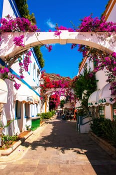 Gran Canaria, Spain, Sep 16, 2018. Puerto de Mogan, also called little Venice, with a small fishing harbour, romantic alleys and beautiful architecture. Popular town with shopping facilities, restaurants and pubs.