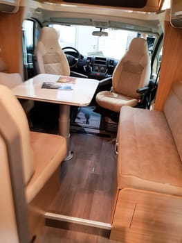 DUESSELDORF, NRW, GERMANY - AUGUST 29, 2018: Duesseldorf, Nrw, Germany - August 29, 2018: Interior with a view of the cockpit of a motor home on a show. Concept freedom, family vacation trip, holiday trip with camper.