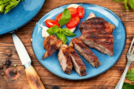 Juicy meat, classic grilled steak, beef steak. Meat barbecue, rump steak.