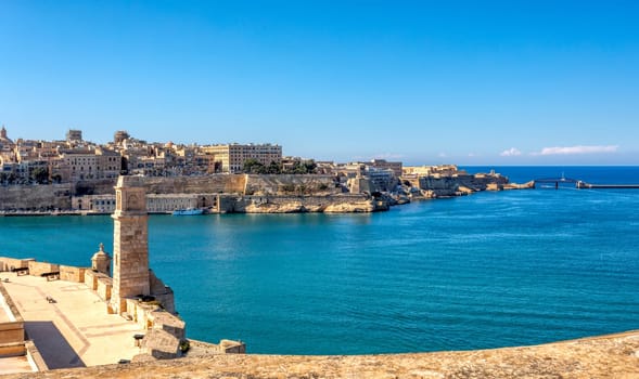 Fort St. Angelo, symbol of Malta's resilience, majestic stone walls, silent witness to rich history. Port in Birgu. View to Fort Saint Elmo. Cultural heritage of Malta