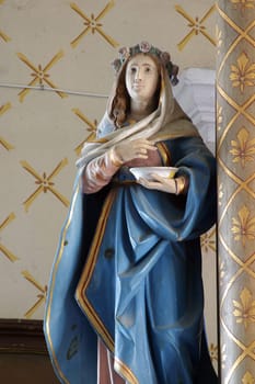 Statue of the Saint on the altar of Saint Joseph in the parish church of the Holy Trinity in Radoboj, Croatia