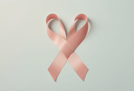 AI generated of soft pink pastel ribbon symbol breast cancer awareness concept on light green pastel background