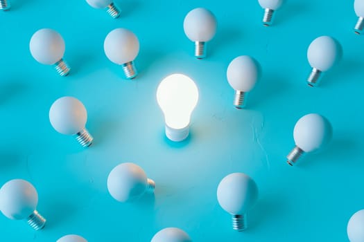 One glowing light bulb standing out from the unlit bulbs. Concept for individuality. AI generated