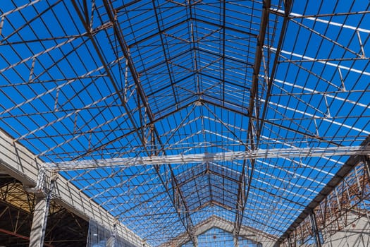 Abandoned warehouse in ruins in Lisbon, harbour area. Portugal