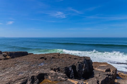 View of ocean waves and fantastic rocky coast in Ericeira, near Lisbon. Portugal