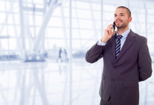 happy business man on the phone, at the office