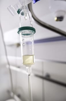 Detail of intravenous medication in a hospital, illness