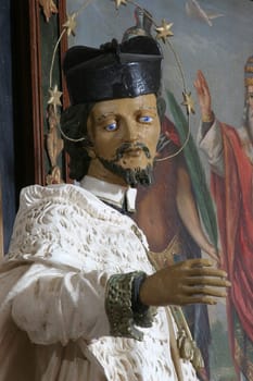 St. John of Nepomuk, statue on the Altar of Saints Fabian and Sebastian in the Parish Church of the Assumption of the Virgin Mary in Gornja Rijeka, Croatia