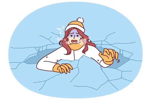 Drowning woman is trying to get out of hole in which fell while walking on frozen lake for concept adverse environmental conditions. Drowning girl got into trouble after natural disaster