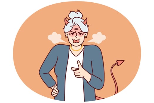 Elderly woman with horns and devil tail screams and points with finger, scolding and threatening opponent. Gray-haired woman pensioner in image of devil feels hatred for concept of senile aggression