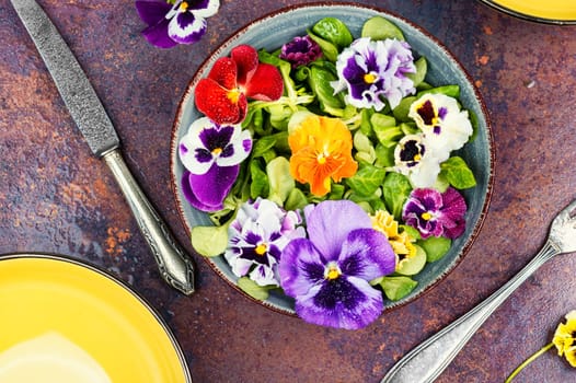 Detox seasonal colorful edible flower salad.
