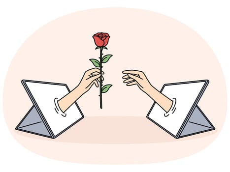 Hand with rose in tablet is metaphor for online relationships and dating using digital gadgets. Online flirting and sending virtual gifts through social network app for distance relationships concept
