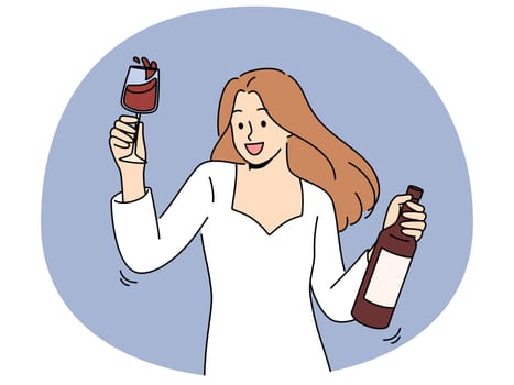 Woman dances at party holding bottle of wine and glass filled with exquisite alcoholic drink. Girl in white dress for party is addicted to alcohol and rejoices at new opportunity to drink
