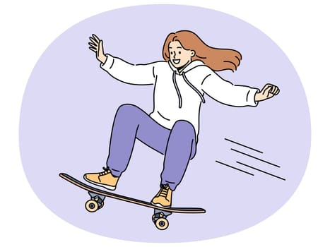 Brave girl skateboarder makes aerial stunt by bouncing on ramp in skatepark. Smiling young woman riding skateboard and enjoying extreme sports wanting to become professional skateboarder