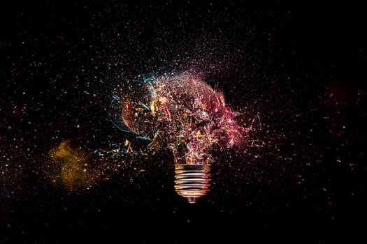 High-speed photo explosion  light bulb  dark background